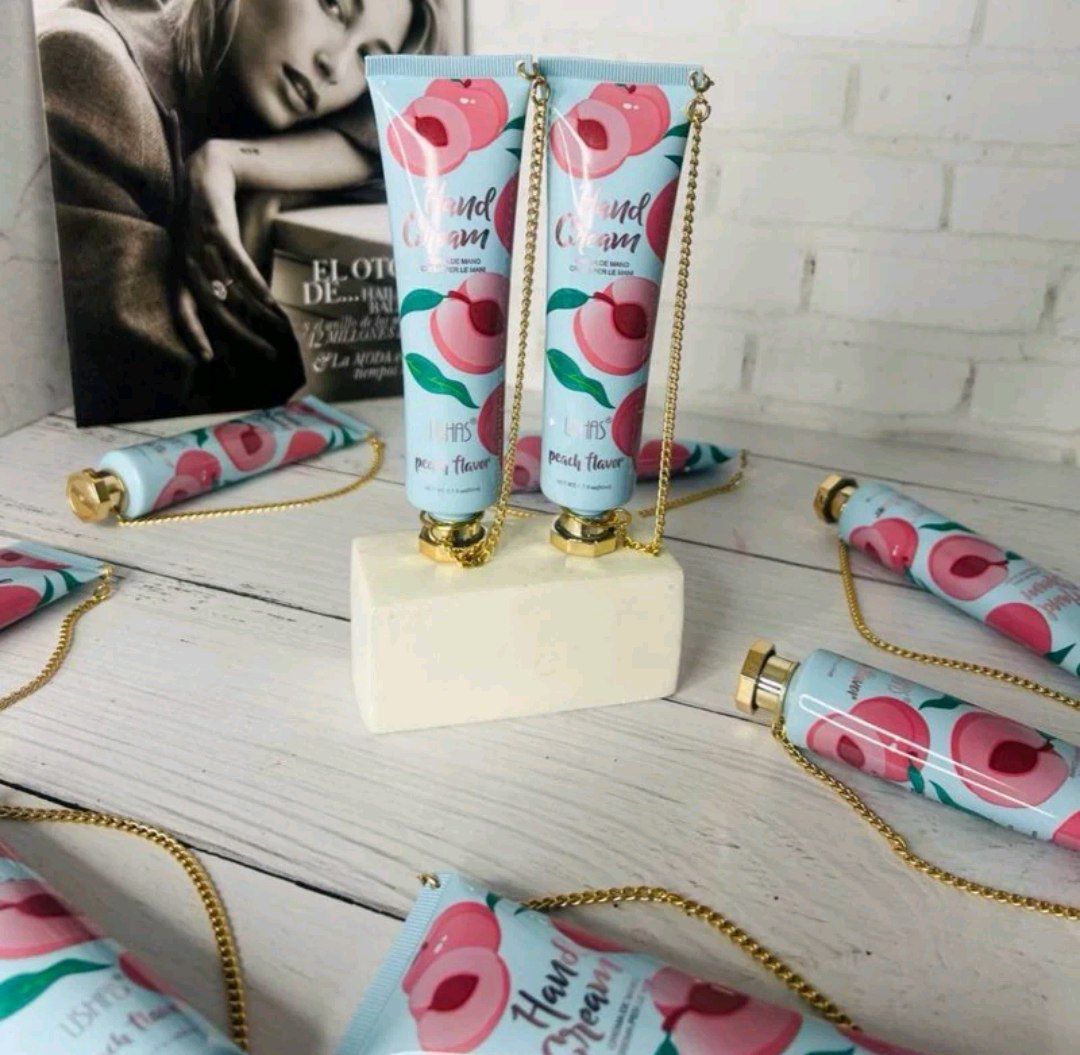 پک ۲عددی کرم دست و صورت هلو و توت فرنگی زنجیردار